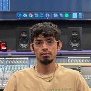 Oz Vega at a mixing console in the studio